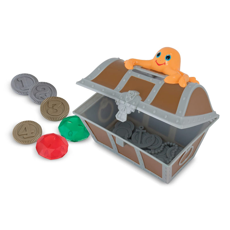 The loose pieces of the Melissa & Doug Sunny Patch Undersea Treasure Hunt Pool Game With Floating Chest and 6 Treasure Pieces