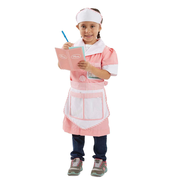 A child on white background with the Melissa & Doug Waitress Role Play Costume Set (7 pcs) - Includes Apron, Order Pad, Cap