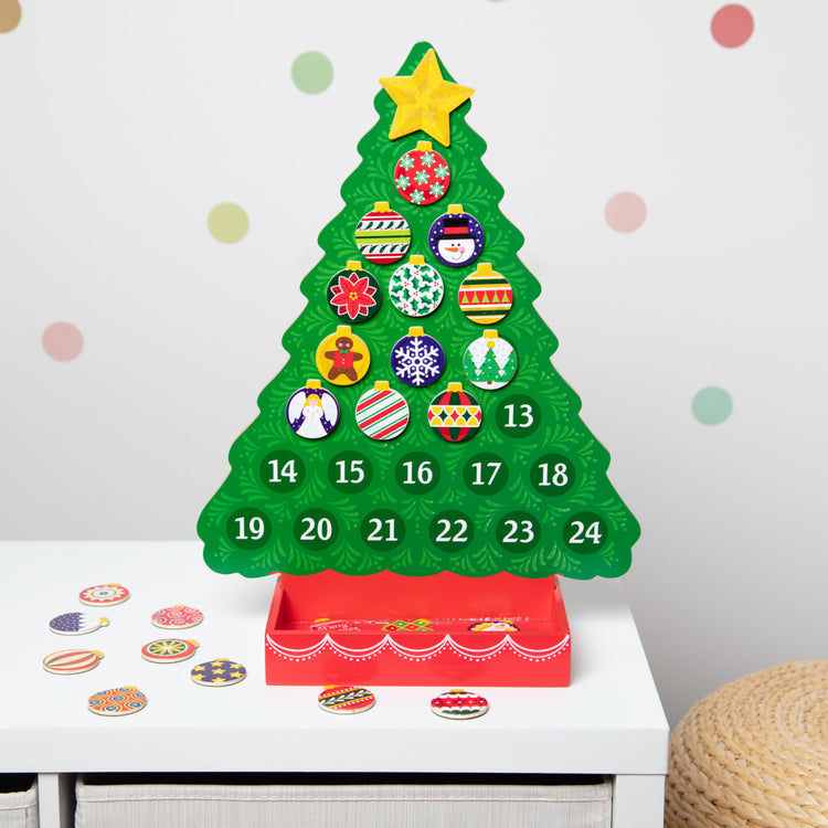 the Melissa & Doug Wooden Religious Advent Calendar - Magnetic Christmas Tree, 25 Magnets
