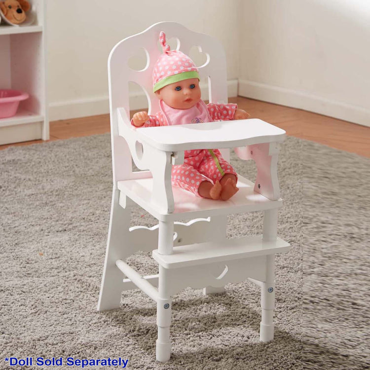 A kid playing with the Melissa & Doug Mine to Love Wooden Play High Chair for Dolls, Stuffed Animals - White (18”H x 8”W x 11”D Assembled)