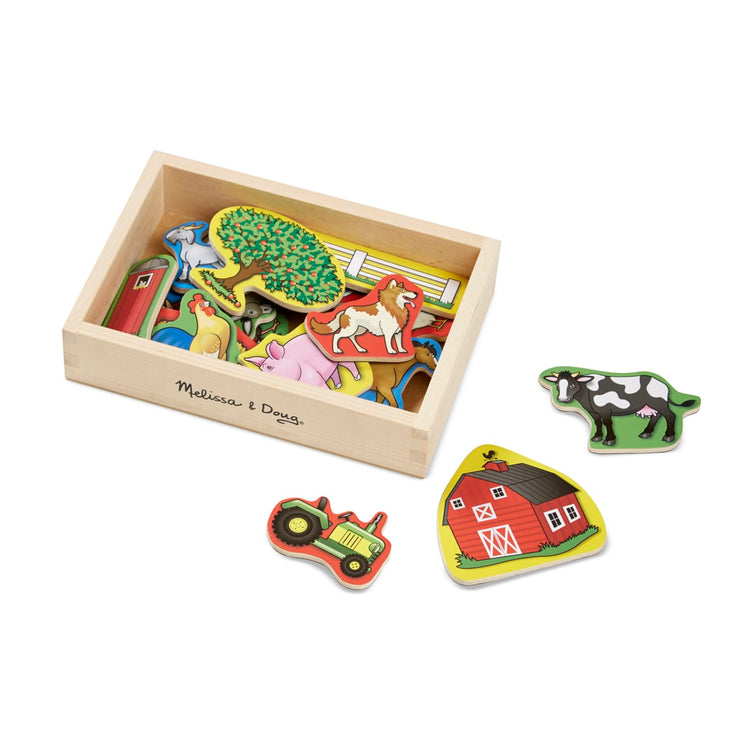 The loose pieces of the Melissa & Doug 20 Wooden Farm Magnets in a Box
