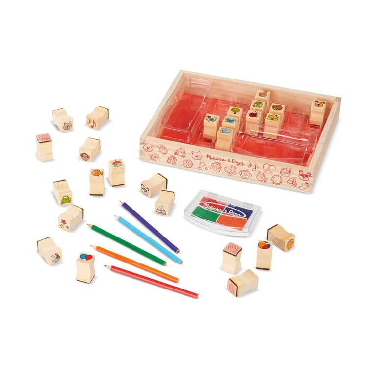 The loose pieces of the Melissa & Doug Wooden Stamp Set, Favorite Things - 26 Wooden Stamps, 4-Color Stamp Pad