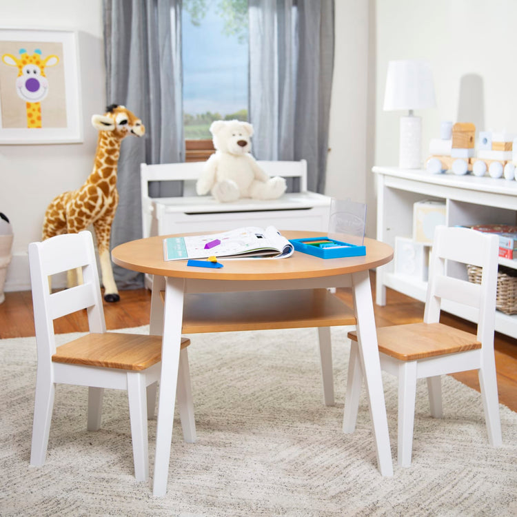 the Melissa & Doug Wooden Round Table and 2 Chairs Set – Kids Furniture for Playroom, Light Woodgrain and White 2-Tone Finish