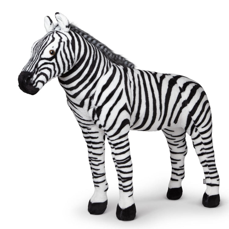 The loose pieces of the Melissa & Doug Giant Striped Zebra - Lifelike Stuffed Animal (nearly 3 feet tall)
